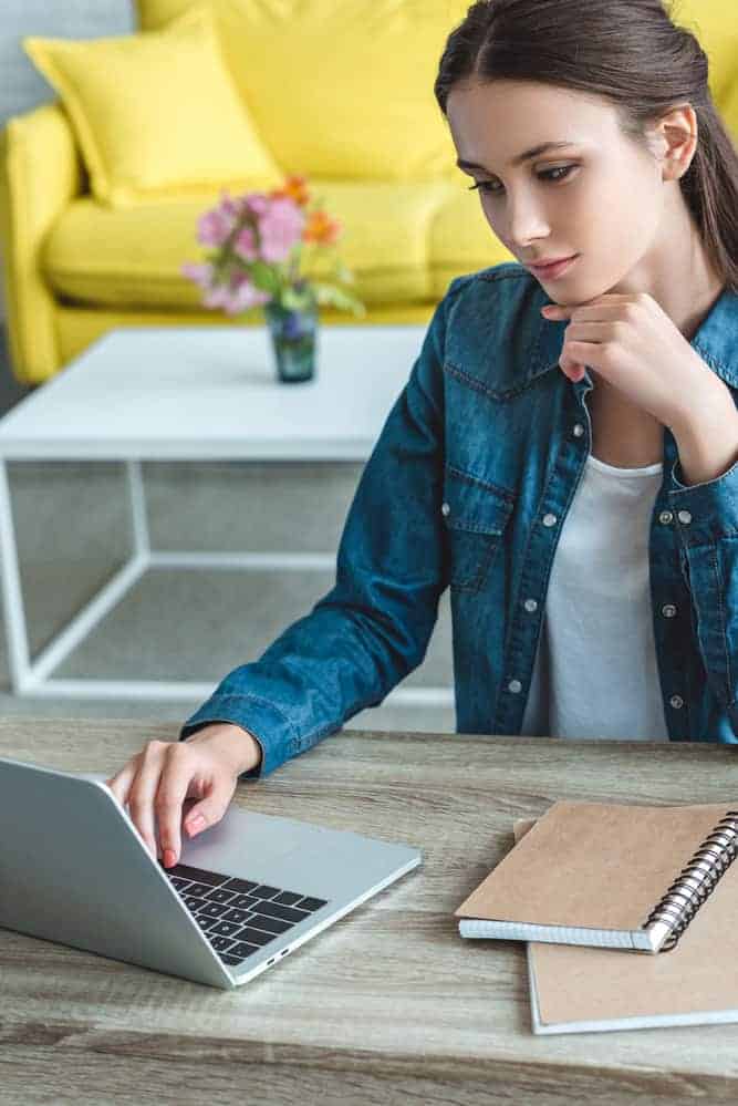 girl on laptop figuring out how can teens make money online