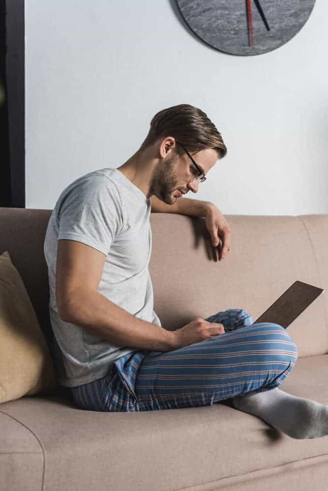 man on laptop looking for part time online jobs with no experience needed