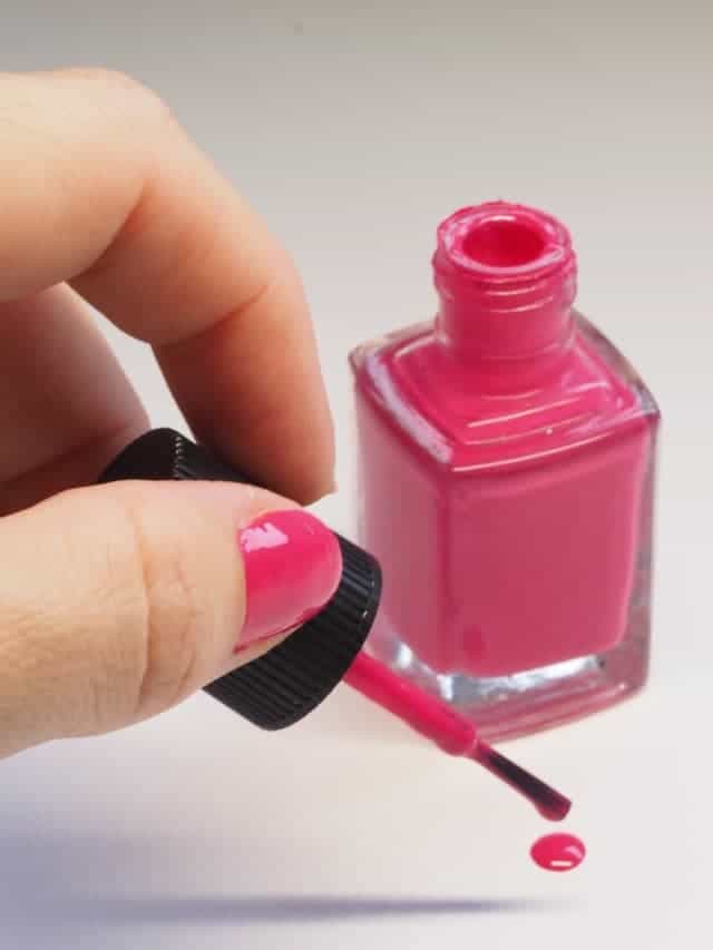 woman with nail polish as a way to reduce expenses and save money