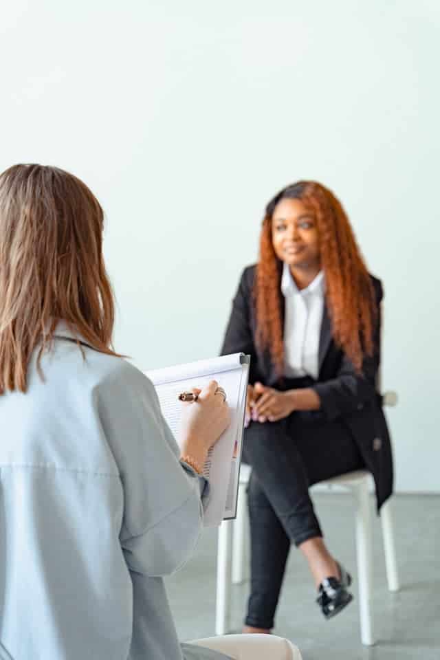 woman talking to doctor