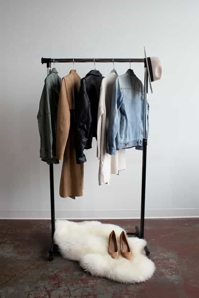 rack with clothes on it to help someone look more expensive