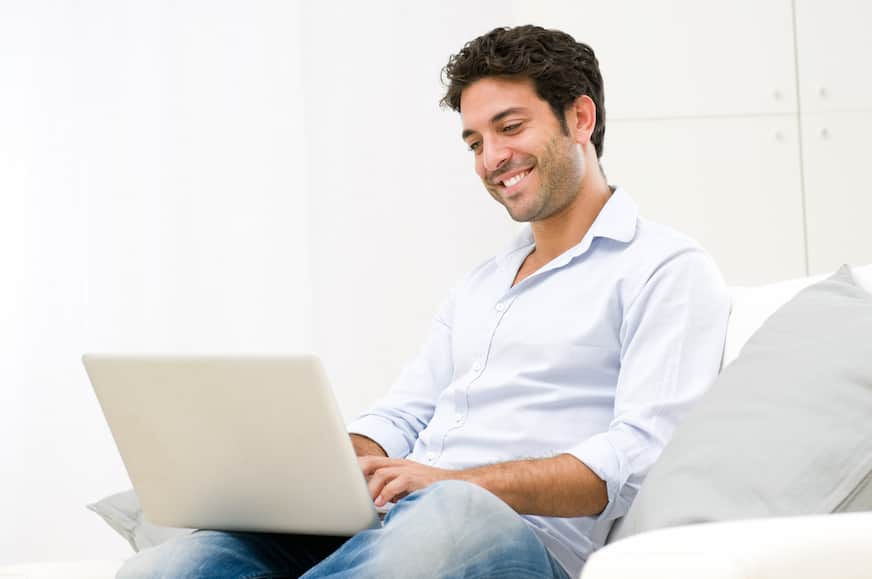 man using his laptop to make money online on Reddit
