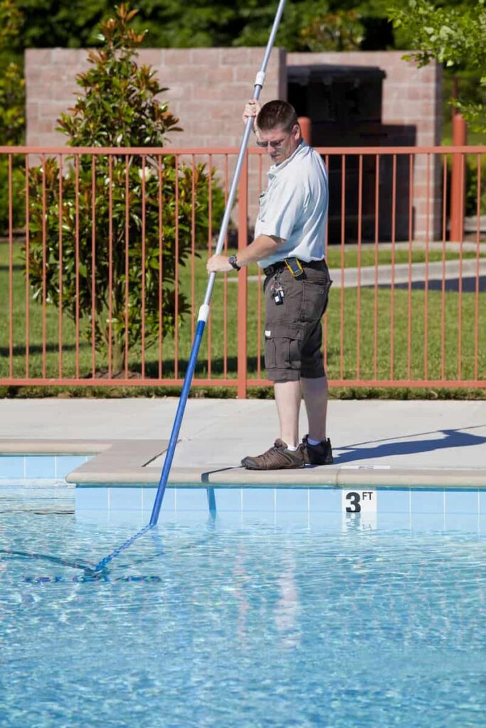 a man cleaning a pool to make $1000 fast