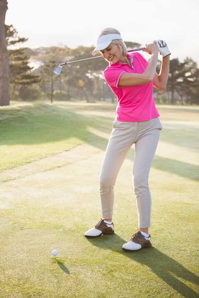 a woman playing golf on her day off