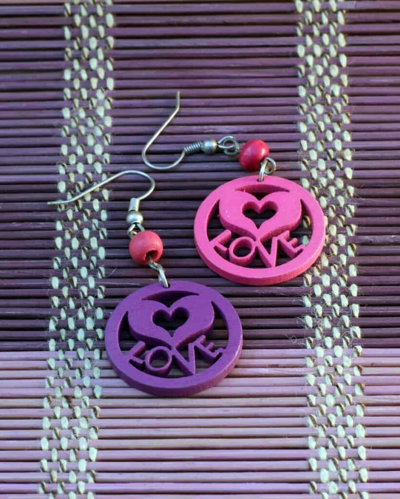 wooden pink and purple earrings one of the wood crafts that sell