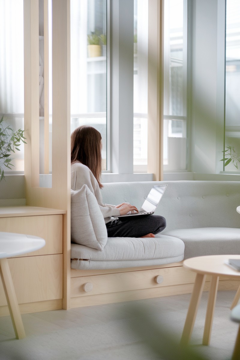 a woman working from home on a laptop to make $3,000 a month